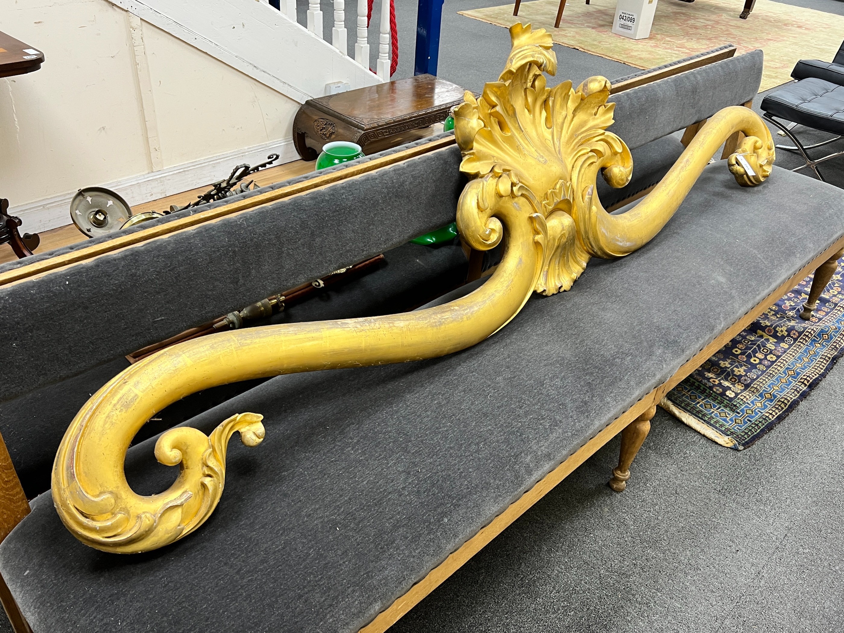 A 19th century Italian carved giltwood acanthus scroll pediment, length 220cm, height 59cm